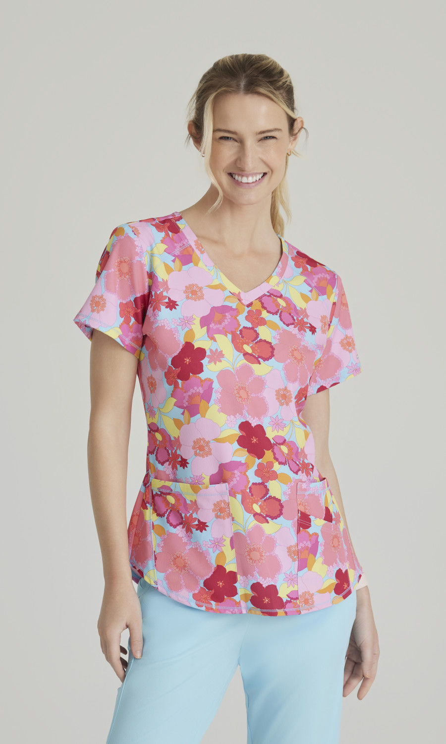 Women  TOP  SKT021  Skechers™ by Barco Womens 3 Pocket V-Neck Scrub Top with Animal Print
